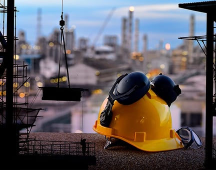 Set of safety work wear on construction background